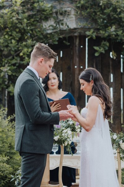 Bride groom and officiant