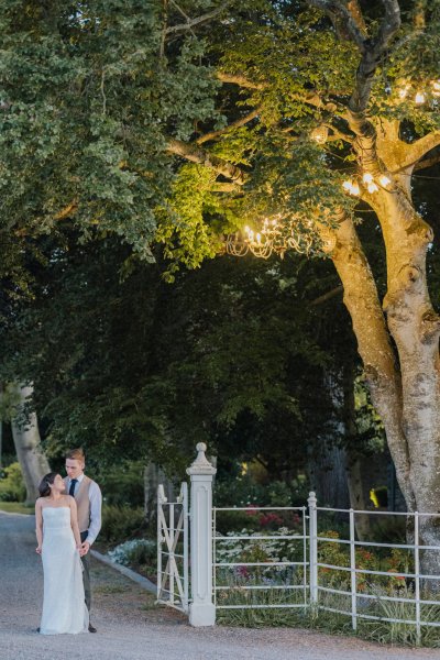 Bride and groom forest shot