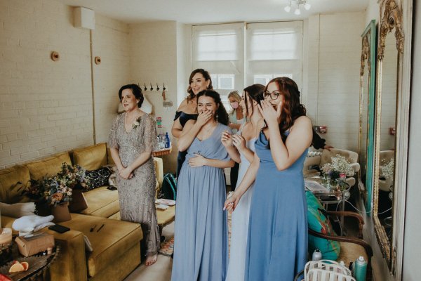 Bridesmaids light sky blue dresses see the bride for the first time