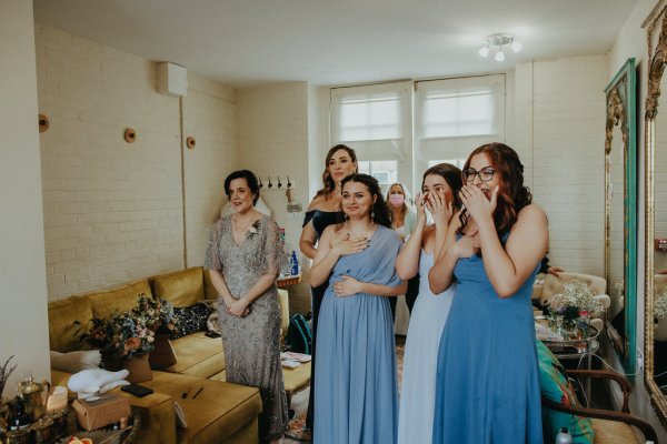 Bridesmaids light sky blue dresses see the bride for the first time