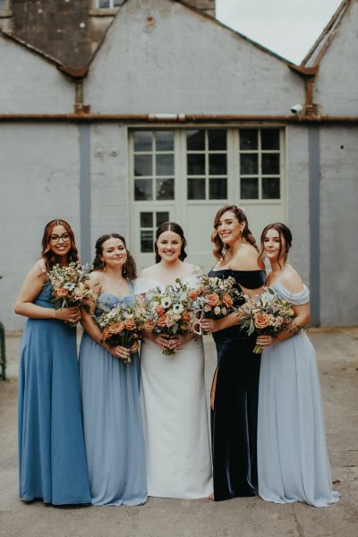 Bride and bridesmaids with flowers