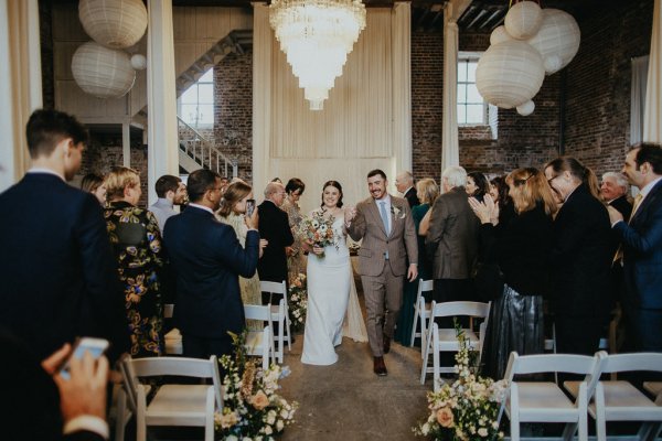 Bride and groom exit ceremonial room