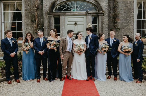 Family shot bride groom bridesmaids and groomsmen