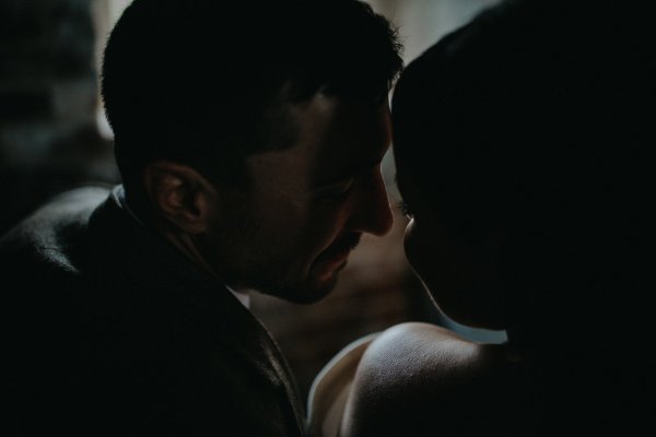 Dark shot of bride and groom