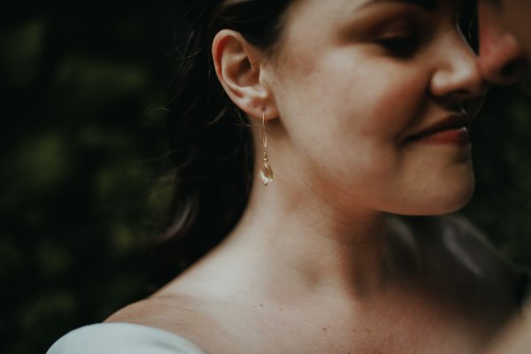 Bride on her own earring details