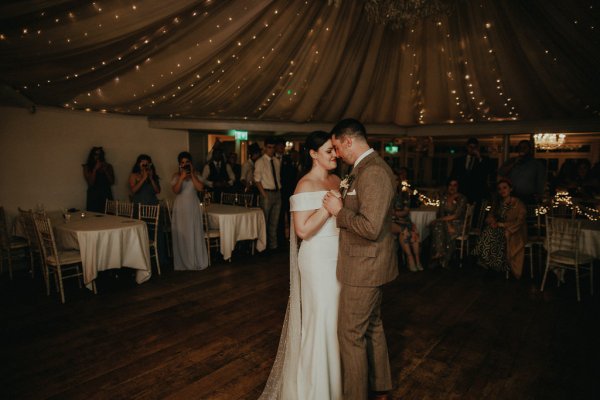 Dancefloor bride and groom marquee lights dancing