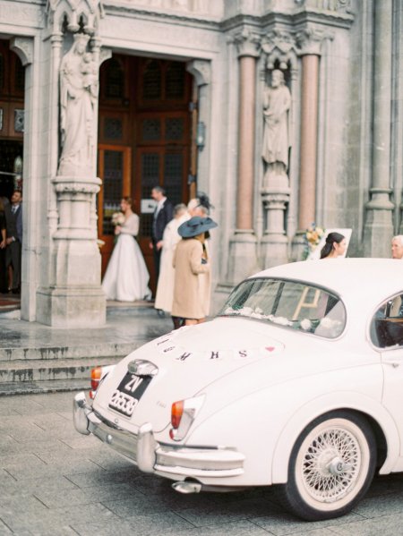 Bride and groom exiting church