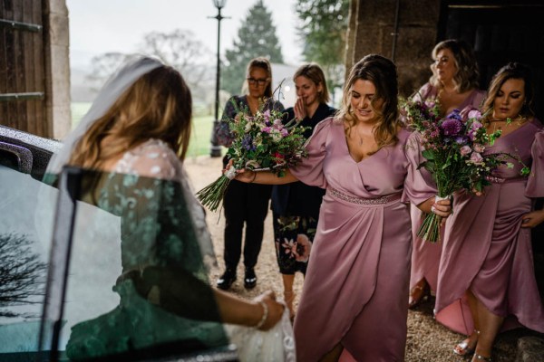 Pink bridesmaid dress and bride flowers