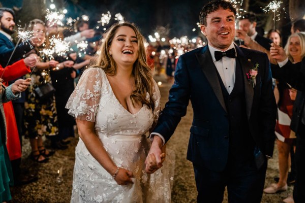 Bride and groom holding hands