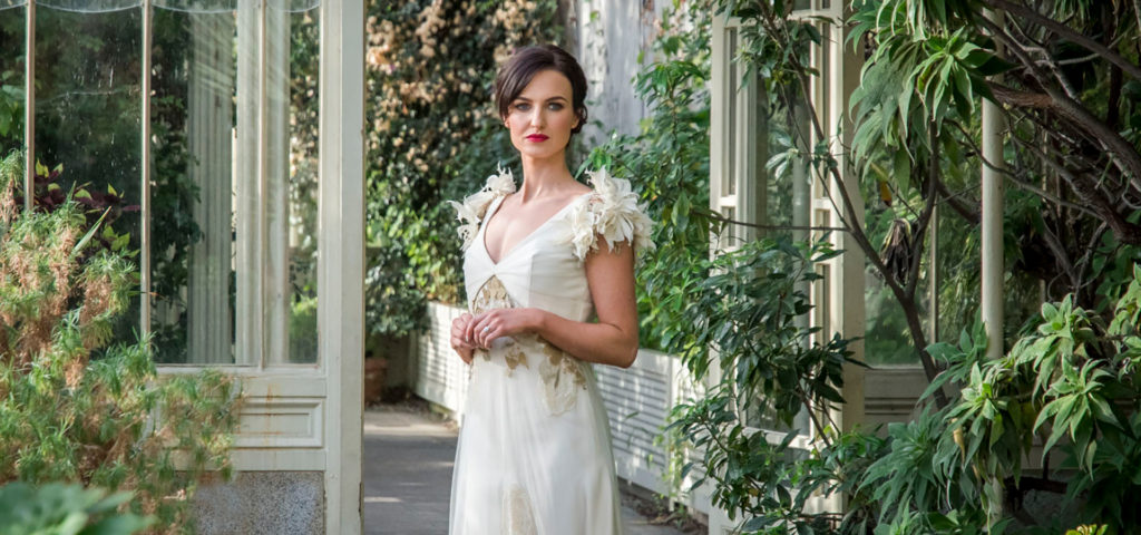 Barnardos Bridal Rooms bride stands in garden