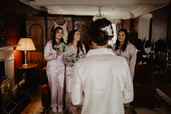 Bridesmaids await bride