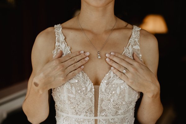 Necklace and chest detail and brides nails