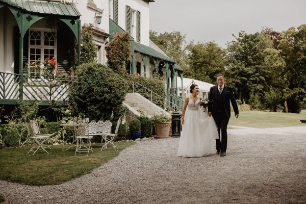 Bride and groom outside wedding venue