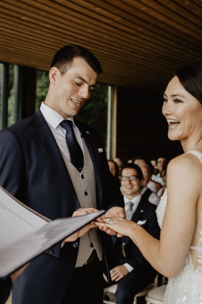 Bride and groom saying their vows at alter during wedding ceremony