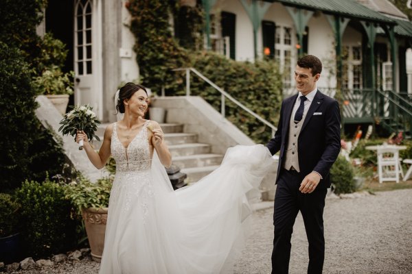 Bride and groom outside wedding venue