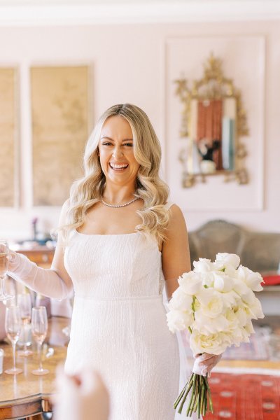 Bride holding bouquet of flowers