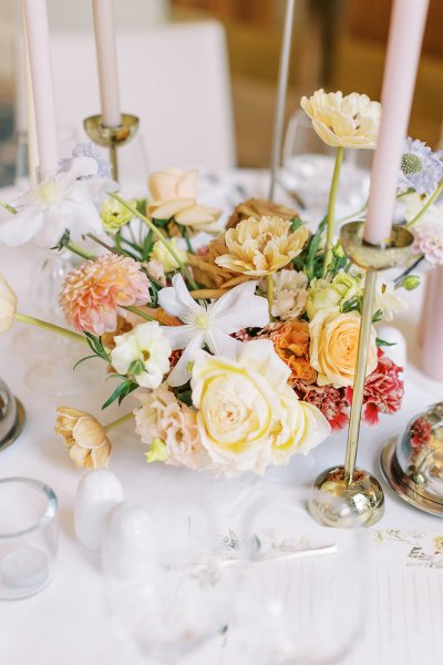 Dining room table candles flowers cutlery roses