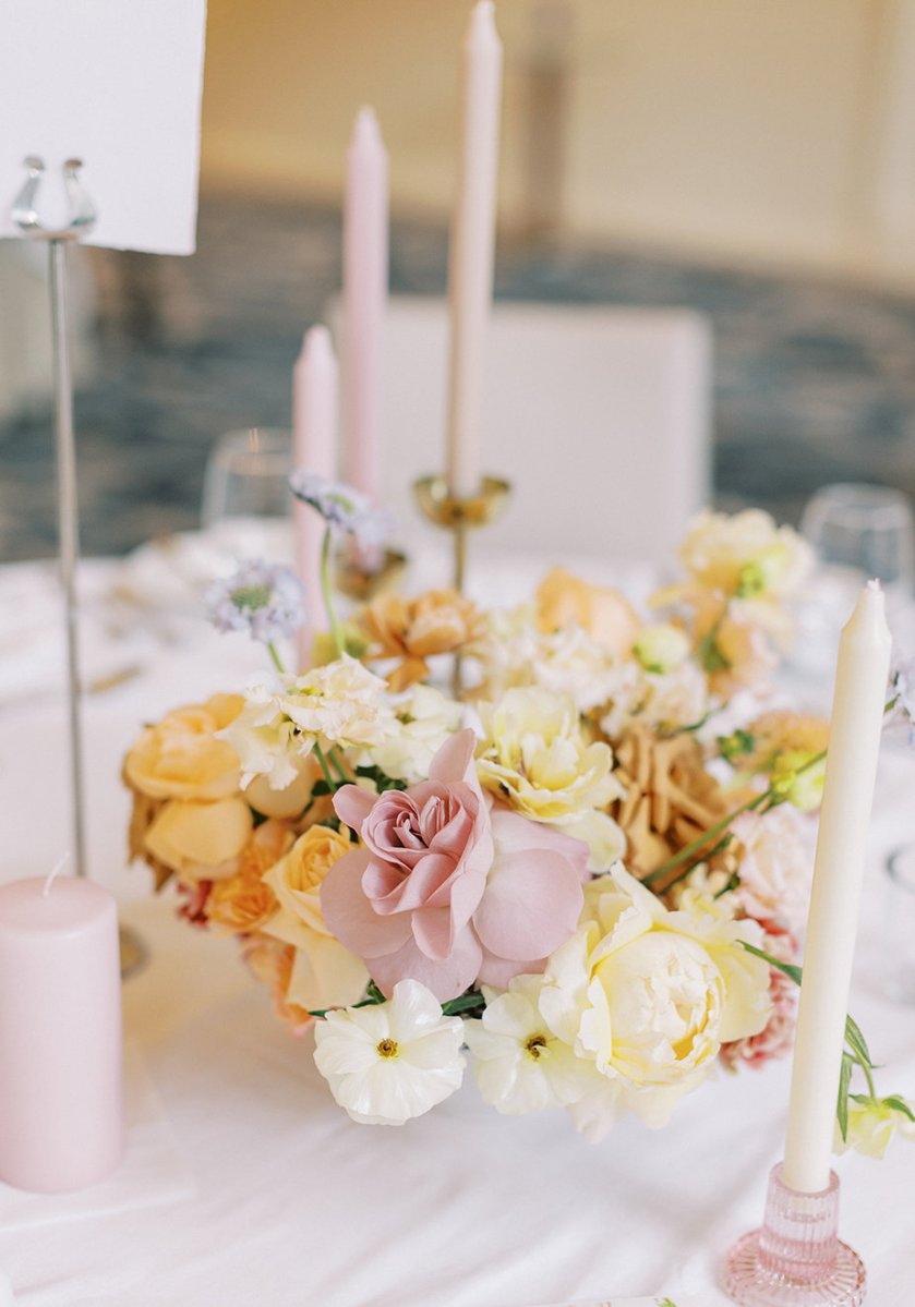 Dining room table candles flowers cutlery roses