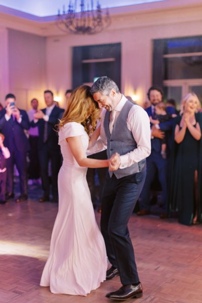 Bride and groom dance dancefloor smiling smile