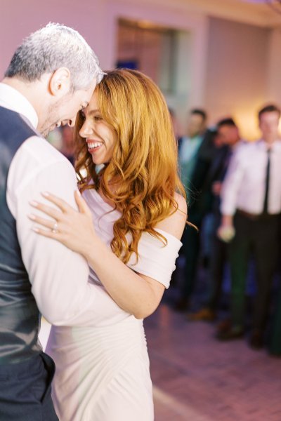 Bride and groom dance dancefloor