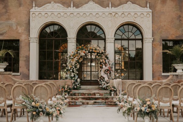 Exterior manor building wedding venue seating area for guests