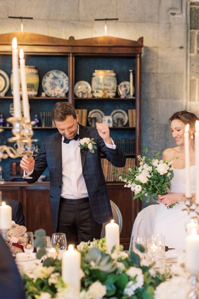 Bride and groom dining room candles lighting