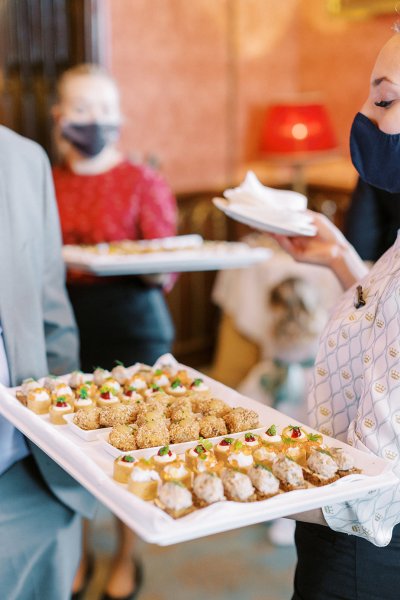 Refreshments being offered to guests at wedding