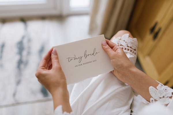 Bride reading emotional letters