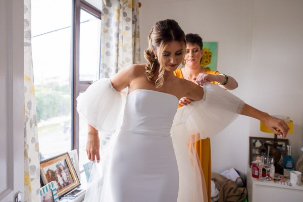 Bride getting ready with bridesmaids