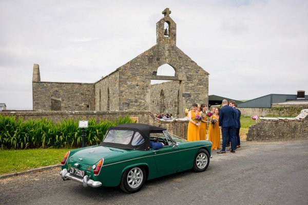 Green wedding car orange bridesmaids dresses