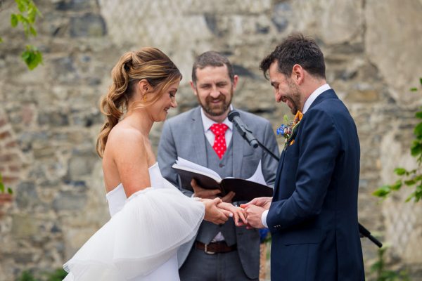 Bride and groom read vows officiant officiate