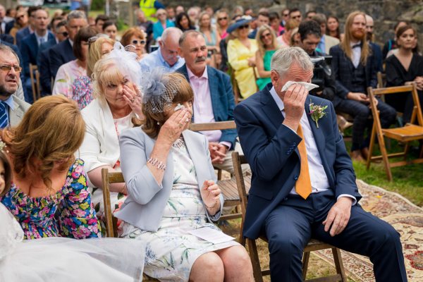 Mother and father cry in audience emotional