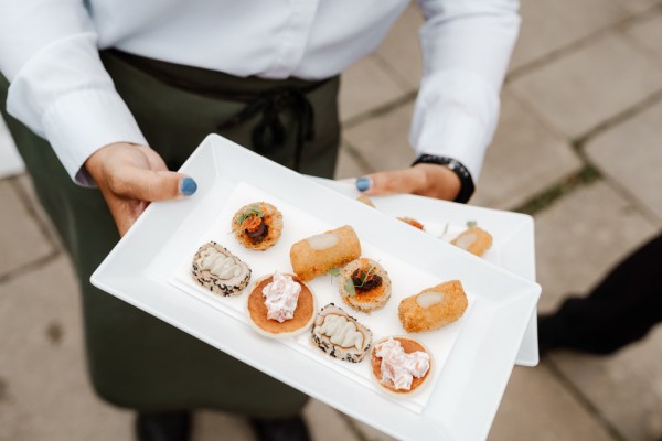 Finger food blue nail varnish detail waitress waiter