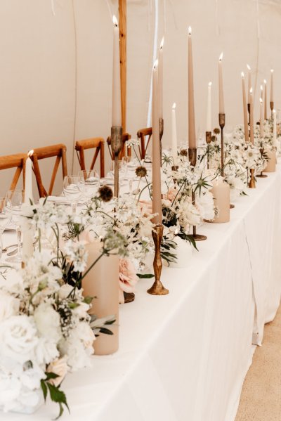 empty dining room roses flowers candles and glasses on table