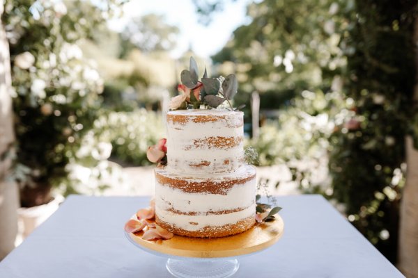 Close up of wedding cake flowers on top