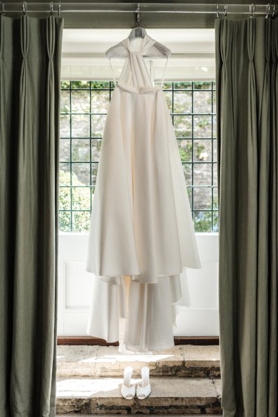 Dress hanging at window