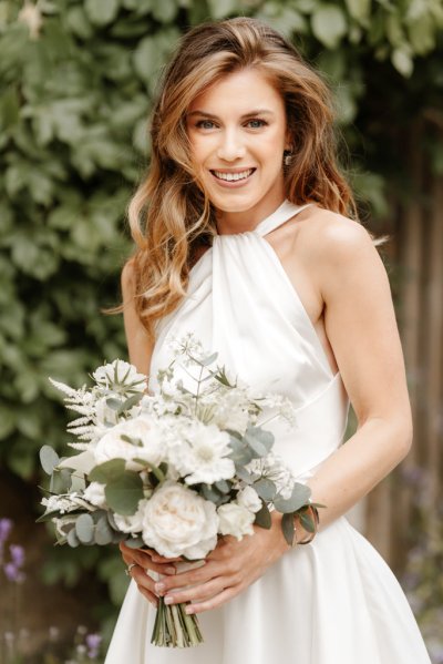 Bride is ready holding bouquet of flowers