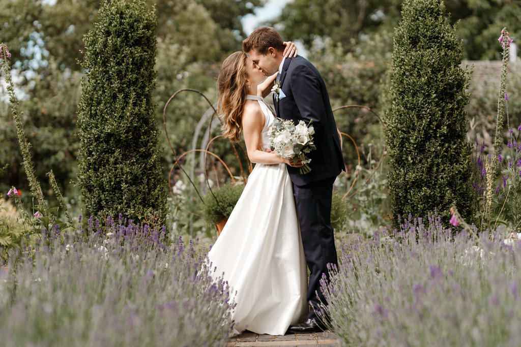 Bride and groom kissing kiss