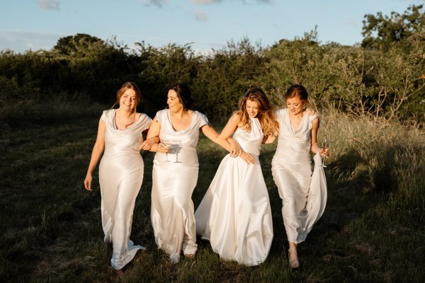 Bride and bridesmaids in garden setting