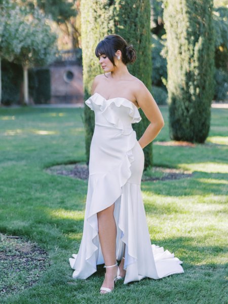 Bride in garden exterior shot Anne Barge