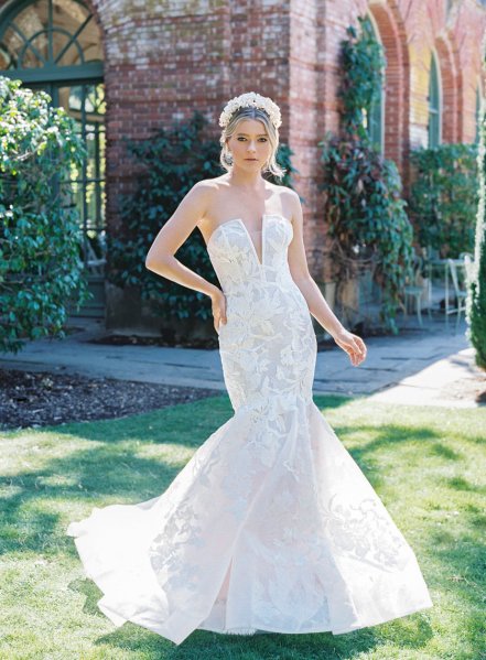 Elegant lace bottom dress bride in garden Anne Barge