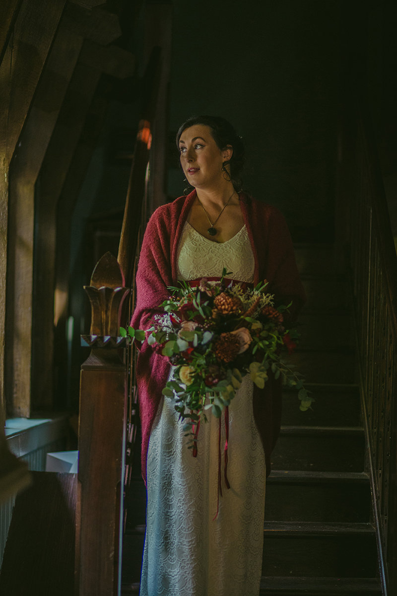 Bride holding bouquet of flowers