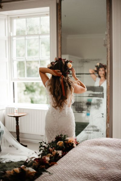 Back of brides dress flower detail in hair