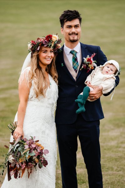 Bride groom and baby