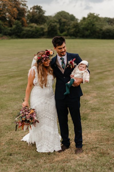 Baby groom and bride bouquet of flowers