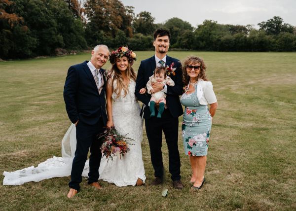 Bride and guests groom and baby