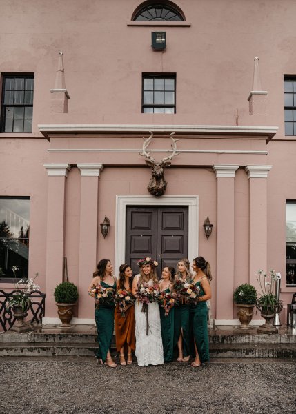 Bride and bridesmaids flowers in hands