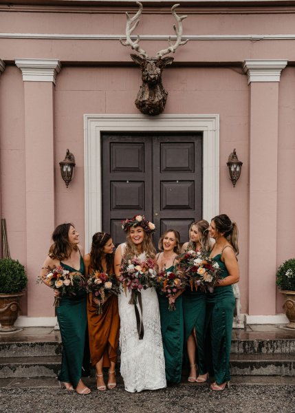 Bride and bridesmaids flowers in hands