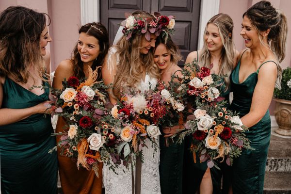 Bride and bridesmaids flowers in hands