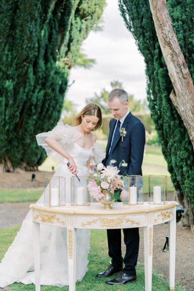 Bride and groom cut the cake